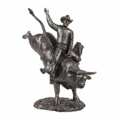 Cowboy Riding Bull Statue