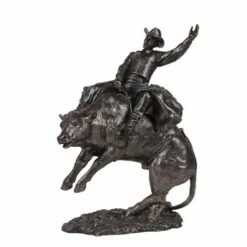 Rodeo Cowboy Riding Bull Statue