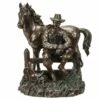 Cowboy At Rest With His Horse Statue