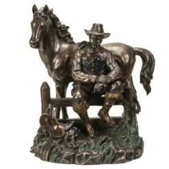 Cowboy At Rest With His Horse Statue