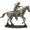 Cowboy At Work Statue