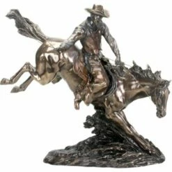 Cowboy On Bucking Horse Statue